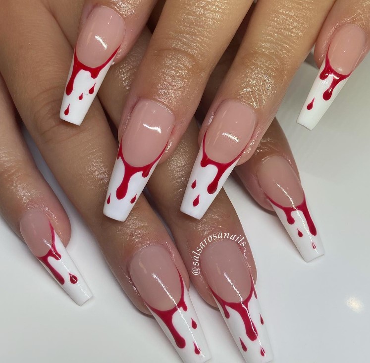 red dripping nails on white French tips