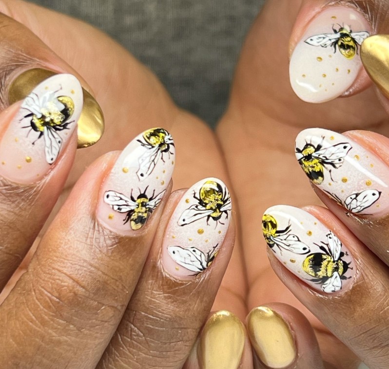 Bumble bee nails with gold accents