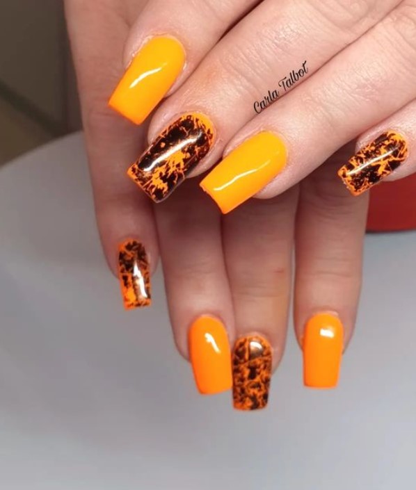 Gorgeous acrylics with Halloween orange