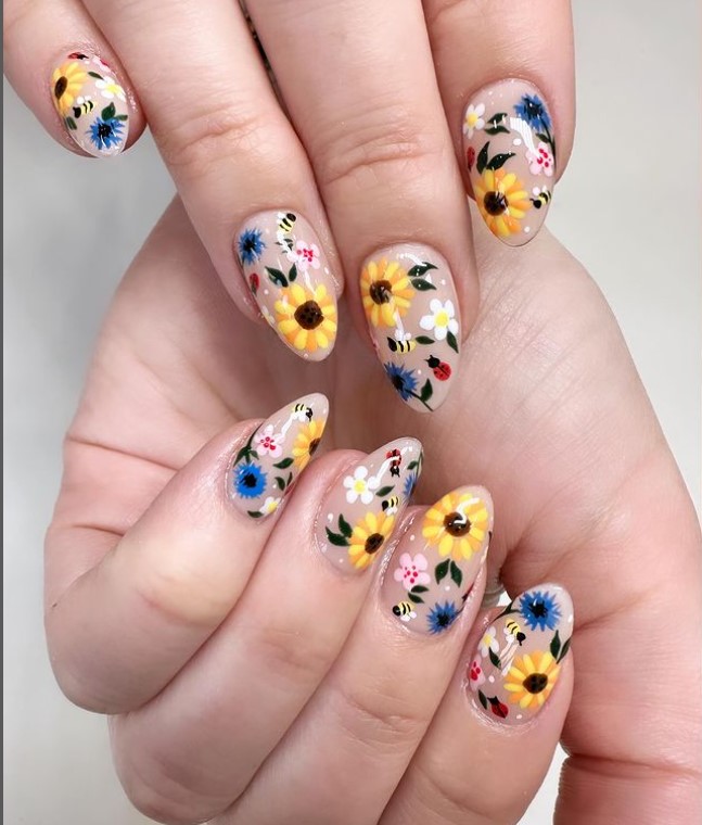 Bee nail design with florals