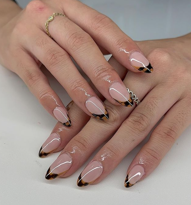 Almond shape French nails with check design