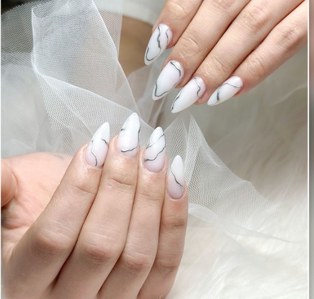 Metallic design on Milky White Nails