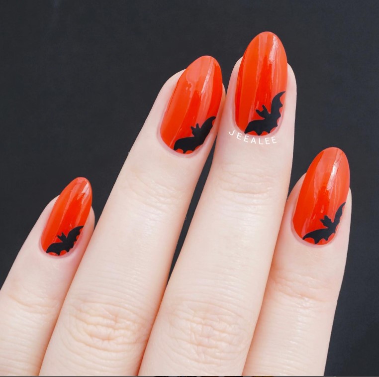 Orange Nails with Baby Bats