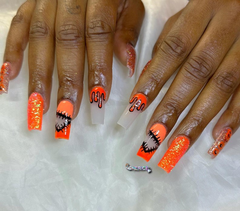 Orange Shimmer Halloween Nails