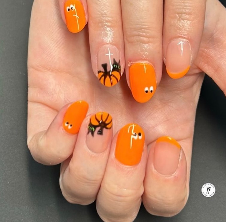 Short Orange nails with Spooky Details