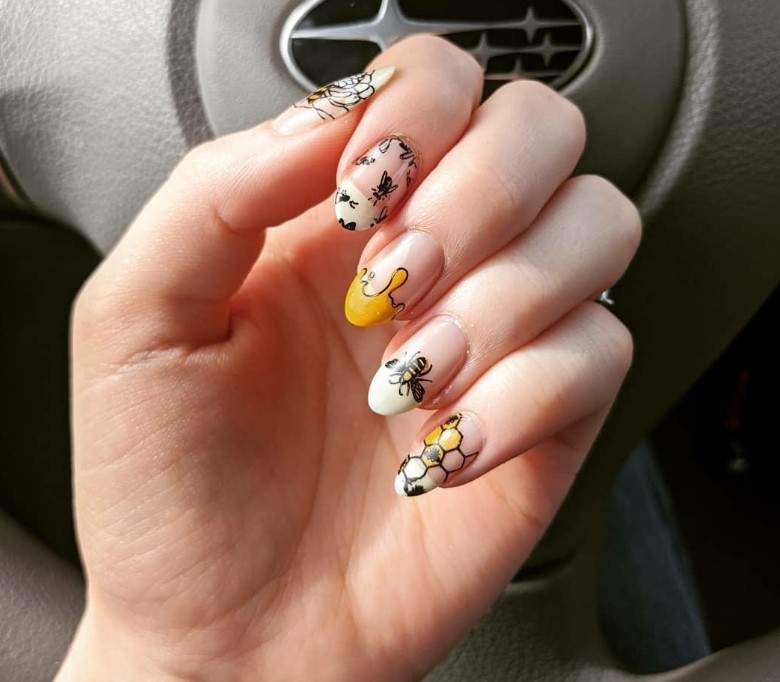 Bee nail design with honeycomb and bees