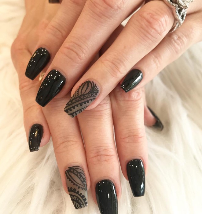 Black Nails with Design on Ring Finger Nail