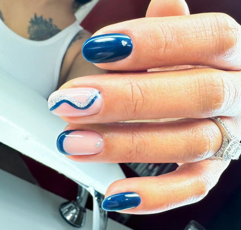 Blue Nails with Art on Blush Nails