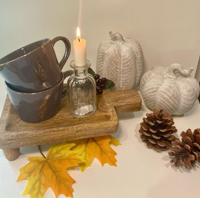 Carved Pumpkins and Fall Leaves