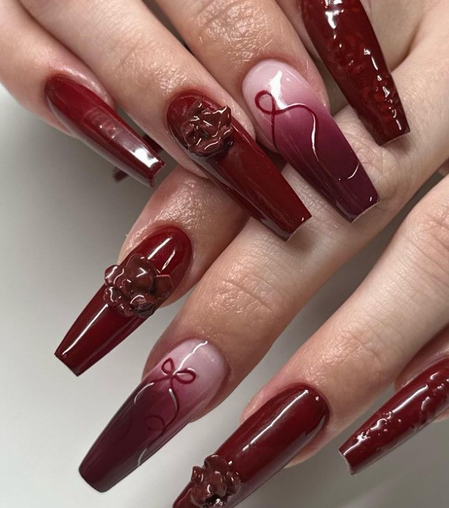 Maroon red Nails with designs