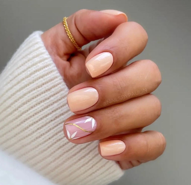 Peachy Square Nails with Design on one Nail