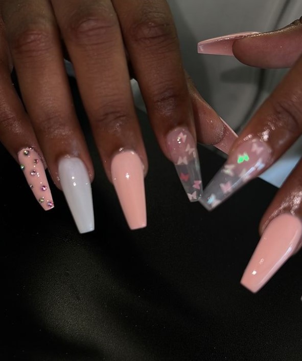 Pink Coffin Nails with encapsulated butterflies