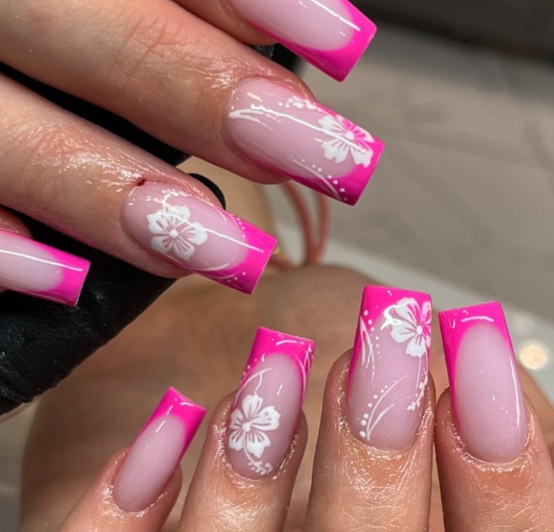 Pink Frenchies with hibiscus on square nails