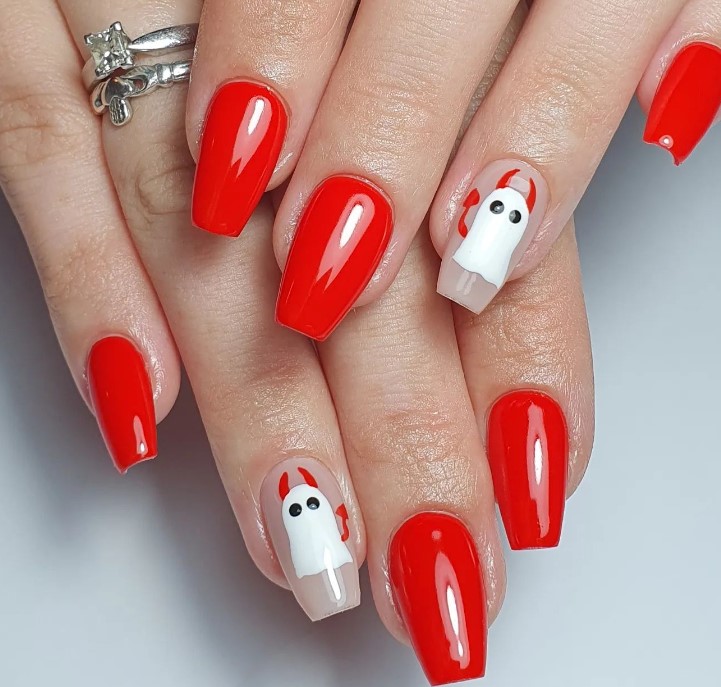  Red Nails with a Ghost on one Nail