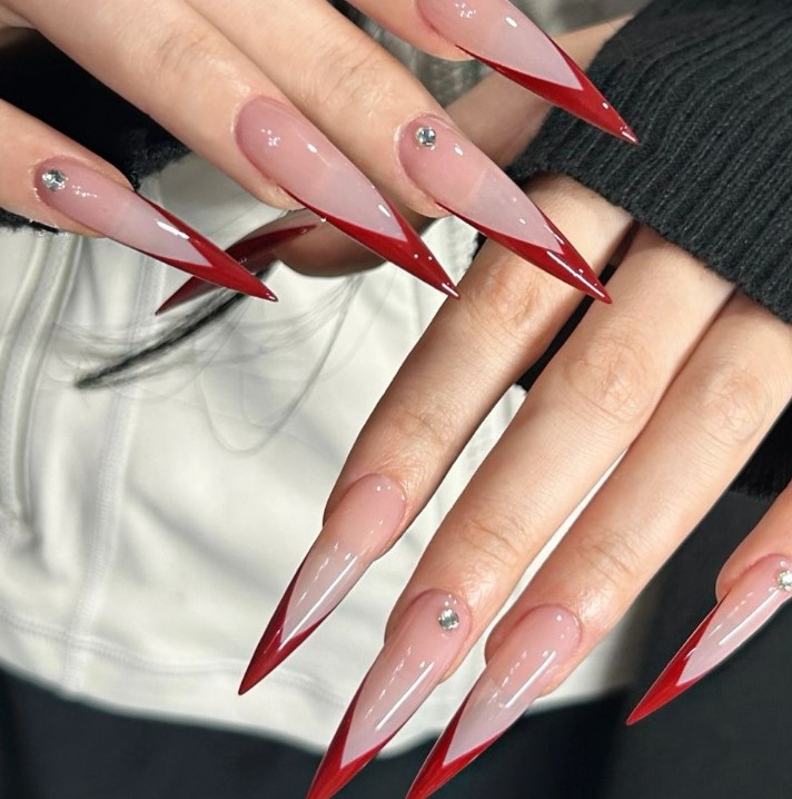 Sharp ad Sophisticated Red Tip nails