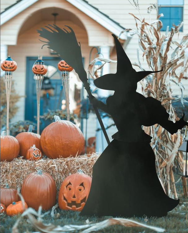 Hallowen front porch decor with witch and Pumpkins