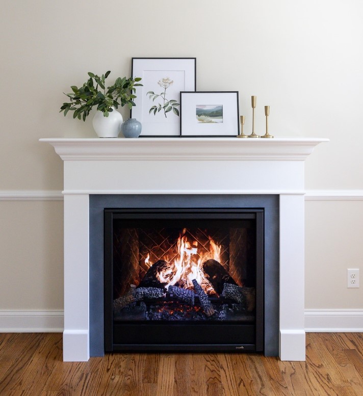 Decorated Mantel Fireplace with Artwork