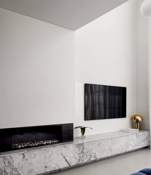 Marble Clad TV console and Fireplace