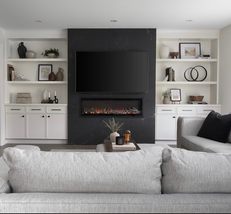 Mounted TV with Fireplace and Shelf Decor