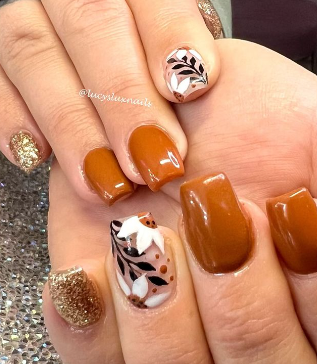 . Fall leaves and burnt orange nails