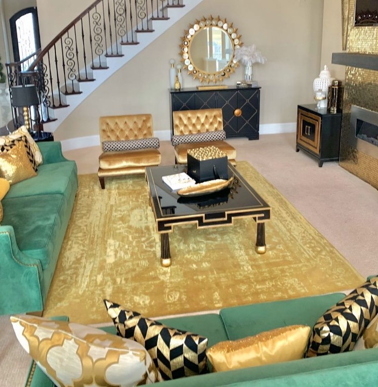 Green Black and Gold Cushions and Sofa in a Living Room