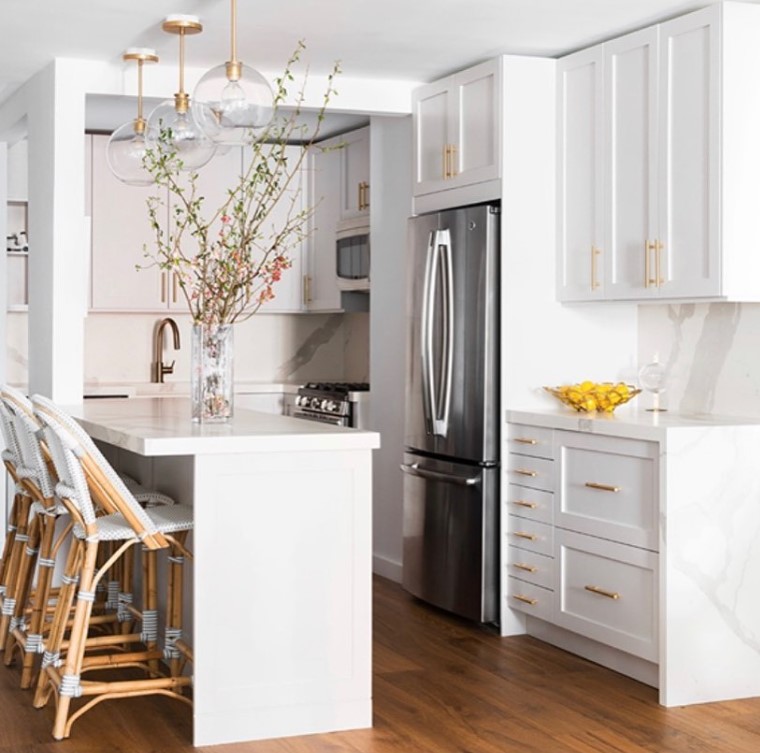 All White Kitchen with Wooden Floor