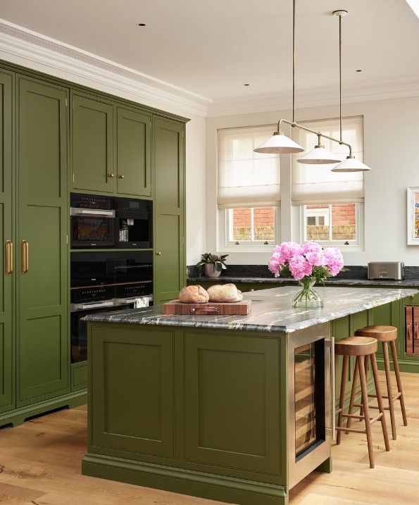 Green Kitchen Cabinets With Designer Countertop