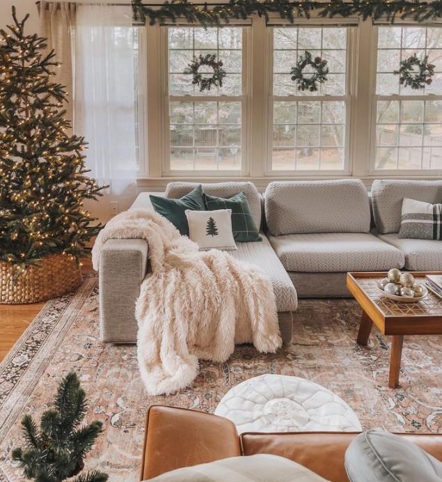 Living Room with Cushions Having Little Christmas Tree Design