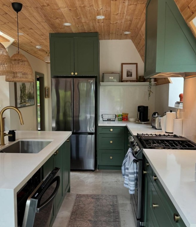 green cabinets with white countertops