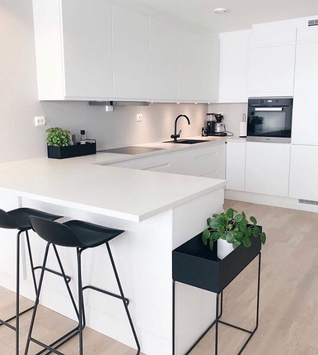 wHITE Kitchen with Black Chairs