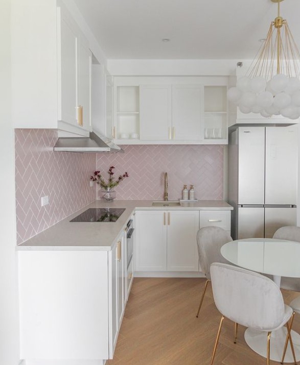 white kitchen with pink Splash